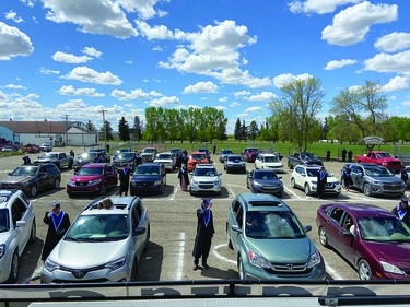 The families of County Central High School graduates took in the May 29 ceremony, held outside the Cultural-Recreational Centre, from their vehicles.