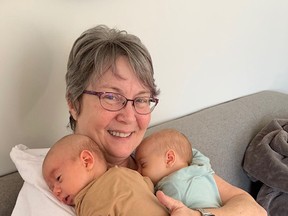 Nurturing Hands Family Wellness Centre executive director Lesley Taylor pictured with a set of twins. The wellness centre has registered as a not-for-profit and plans to make its services more accessible for those who may not be able to afford them. Supplied Photo