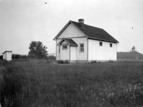 From the scrapbook. Caption: Didn’t all country schools look the same somehow? 
(Les Green)