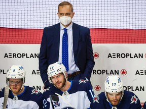 Winnipeg Jets head coach Paul Maurice on his bench against the Calgary Flames during the third period at Scotiabank Saddledome in May 2021. Sergei Belski-USA TODAY