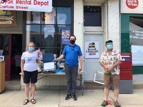 There were balloons and cupcakes as Saugeen Shores Mayor Luke Charbonneau (centre) congratulated Thorncrest Outfitters owners Janette and Tim Thorne on the 25th anniversary of their business in Southampton June 5. [Supplied].