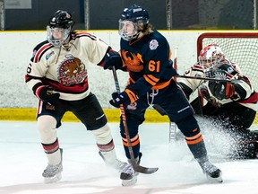 Photo courtesy NOJHL

Soo Thunderbirds centre Cooper Smyl (middle) battles for position with Blind River defenceman Teegan Dumont in front of goalie Gavin Disano in 2020-2021 NOJHL action