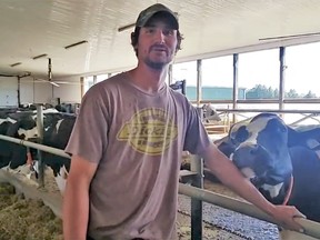 Jamie Farrell in his milking barn. SUBMITTED