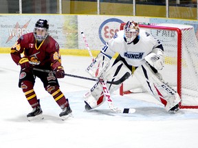Timmins forward Nicolas Pigeon, shown here looking for a deflection in front of Crunch goalie Liam McCarthy during an NOJHL game at the Tim Horton Event Centre in Cochrane on March 13, will be returning to the Rock lineup for the 2021-22 NOJHL campaign. Following the departure of a number of key veterans this offseason, the Rock will be looking for Pigeon to provide more offence in the upcoming season. FILE PHOTO/THE DAILY PRESS