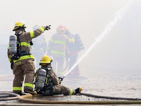 Chatham-Kent firefighters battle a blaze at the Polish Canadian Club on Inshes Avenue in Chatham, Ont., on Wednesday, May 19, 2021. Mark MalonePostmedia Network