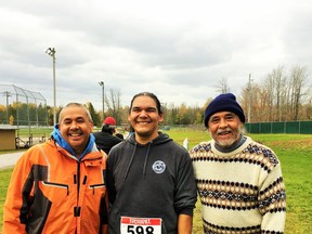 Jeff Eshkawkogan, Michael Eshkawkogan and Jerry Eshkawkogan at the 2020 Wiikwemkoong Road Race.