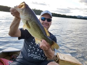 The author with a nice largemouth he caught during the 2019 bass fishing season.