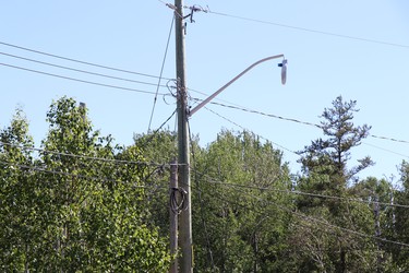 Hydro pole is damaged following a collision near Boundary Road and South Market Street on Friday, June 18, 2021. (BRIAN KELLY/THE SAULT STAR/POSTMEDIA NETWORK)