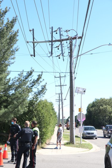 Hydro pole is damaged following a collision near Boundary Road and South Market Street on Friday, June 18, 2021. (BRIAN KELLY/THE SAULT STAR/POSTMEDIA NETWORK)