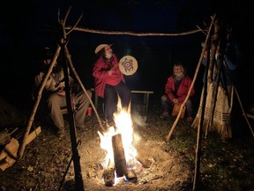 TJ Stables co-owner Terry Jenkins leads a campfire experience at the recreational horse operation, which has launched a new program to teach visitors about Indigenous culture and history through Ojibwe spirit horses in Chatham, Ont. Contributed Photo