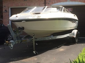 Police are asking the community for tips regarding the recent theft of this boat and trailer from a driveway on Front Road in the former Charlotteville Township. – Norfolk OPP photo