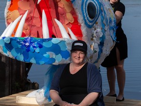 Artists Krista Dalby, foreground, and Nella Casson with their float, "Plastic Bites Back."