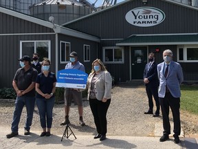 Taking part in today’s announcement at the Young Farm in Brockton that 501 homes and businesses will soon be able to connect to more affordable natural gas line are, from left: Les Young, Darren McCrank, Director, Operations, Ontario Region, Tammy Young, David Young, Lisa Thompson, MPP Huron-Bruce, Bill Walker, Associate Minister of Energy, and Chris Peabody, mayor of Brockton.SUBMITTED