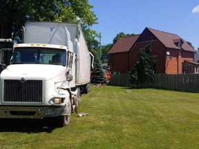 No one was injured Wednesday when a transport truck struck a house in the community of Springfield, northeast of Aylmer. Elgin OPP are investigating the crash. OPP photo