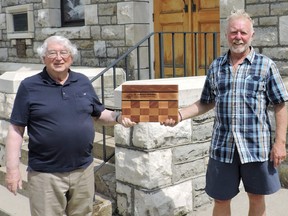 OVTA Tourism Awards co-chairman Chris Hinsperger (right) presented Preston O’Grady, of the Bonnechere Museum, with the 2021 Marilyn Alexander Tourism Champion of the Year award.