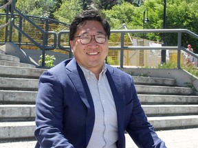 Dr. Jia Hu poses for a photo in Prince's Island Park. Saturday, June 26, 2021. PHOTO BY BRENDAN MILLER/POSTMEDIA