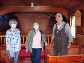 The Lac Ste. Anne Historical Society, including Judy Rhese and Mary and Bill Myndiuk, helped bring Sangudo’s St. Mary the Virgin Anglican Church to Rochfort Bridge Museum. The building, constructed in 1924 and decommissioned in 2019, will be preserved as a result of the historical society’s efforts and community support.