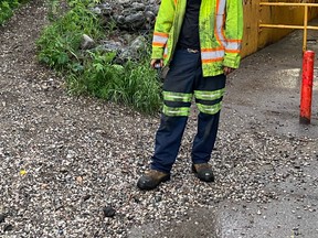 A tow truck driver from Flat Rate Towing works security at tent city, Tuesday, located at the corner of Third Avenue West and Ferguson Street. The North Bay Parry Sound District Health Unit asked Katie Valiquette and Chris Brown from Hope's Kitchen, who have been overseeing the encampment, to keep it open in order to contain a COVID-19 outbreak among the homeless. The health unit has not confirmed to the media that an outbreak or any cases exist among the homeless population. Submitted