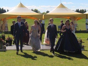 Students of St. Micheal's graduating class participate in the grand march at their convocation ceremony June 26.