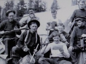 •	IMG_1501 – Although the life of a surveyor was not always an easy one, there were times for recreation – not all work and no play. In this photograph of an ALS Weir Album photograph from Judy Lamour’s Laying Down the Lines: A History of Land Surveying in Alberta, we see a surveying crew making music.