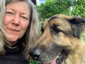 New marketing manager Anne Munro with Lucky, her family's dog.