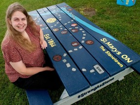 Laura McAsh thought a St. Marys-themed board game would make a good addition to this picnic table at Milt Dunnell Field. McAsh is one of 10 local artists who took part in town-wide project to add some colour to public picnic tables in St. Marys earlier this year. Chris Montanini\Stratford Beacon Herald