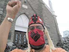 Pembroke resident Duane Gastant' Aucoin, a Tlingit from Teslin, Yukon, conducted a silent witness on Friday, June 25 before St. Columbkille's Roman Catholic Cathedral to honour the 751 Indigenous children whose bodies were discovered on the grounds of a former residential school in Saskatchewan.