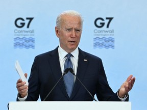 (FILES) In this file photo US President Joe Biden takes part in a press conference on the final day of the G7 summit at Cornwall Airport Newquay, near Newquay, Cornwall on June 13, 2021. - The global infrastructure plan announced by G7 leaders aims to offer developing nations a credible alternative to China's much-criticized Belt and Road Initiative -- but it faces major hurdles on the ground, especially if Beijing's hiccups are any indication. US President Joe Biden was able to convince the G7 to sign onto the initiative, drawing allies into Washington's strategic rivalry with Beijing, under a plan titled "Build Back Better World" (B3W) that aims to provide hundreds of billions in infrastructure investment to developing nations. (Photo by Brendan SMIALOWSKI / AFP) (Photo by BRENDAN SMIALOWSKI/AFP via Getty Images)