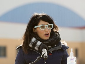 Minister for Culture, Multiculturalism and the Status of Women Leela Aheer takes part in the official groundbreaking of the Edmonton South Soccer Centre Expansion Project, 6520 Roper Rd., in Edmonton Tuesday March 16, 2021. Aheer and Community and Social Services Minister Rajan Sawhney both said Kenney should voice regret for the gathering where he and ministers appear to violate COVID-19 distancing rules.