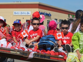 Parade-goers enjoy the sunshine on Canada Day. Photo by Dave Truscott/DBC Facebook.