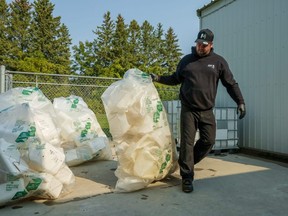 Collecting Ag Plastic Containers for Recycling_Cleanfarms Photo