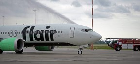Flair Airlines inaugural flight of its new Boeing 737 MAX 8 aircraft landed at Edmonton International Airport with water cannons welcoming the aircraft on Thursday June 10, 2021. It was the first of 13 new Boeing 737 MAX 8 aircraft that Flair Airlines is adding to its fleet.