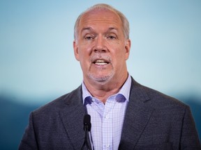 B.C. Premier John Horgan responds to questions during a post-election news conference, in Vancouver, on October 25, 2020. Horgan said the province would be moving to Step 2 of its reopening strategy on June 15, but the travel advisory against interprovincial travel remains in effect.