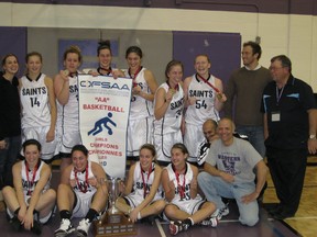 Photo Provided

Saints head coach Jim Pedatella (front row, far right), his assistant coaches and players are jubilant after winning the 2010 all-Ontario AA girls basketball championship in Sarnia