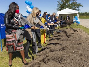 Ward 13 Coun. Arielle Kayabaga, left, and London West MP Kate Young take part in a groundbreaking ceremony last year for a new Anvo Pharma plant on Bonder Road in London. The company plans to make generic drugs for heart disease, diabetes and neurological diseases at the plant expected to open in February 2021. Photograph taken on Friday September 18, 2020. (Mike Hensen/The London Free Press)