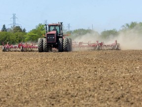 Shelley Bloetjes, whose family farm is in the Dorchester area, cultivates a 40-hectare field on Scotland Drive last week before corn is planted. Bloetjes said the soil conditions "are perfect," with the sunshine and wind drying everything out "really nicely." The dry conditions are being mentioned by the Upper Thames River Conservation Authority that says the watershed is in a low water condition. (Mike Hensen, The London Free Press)