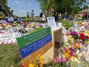 Signs proclaiming solidarity are going up across London and at the memorial site at Hyde Park and South Carriage roads, where four members of a Muslim family died after being hit by a pickup June 6 in what police say was a targeted, hate-motivated attack. (Mike Hensen/The London Free Press)
