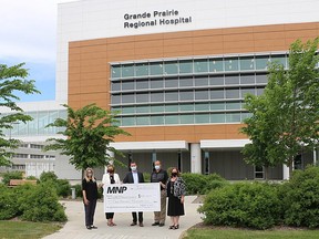 Partners from the Grande Prairie MNP office donated $100,000 over the past five years to both the Grande Prairie Regional Hospital Foundation and Grande Prairie Regional College. The money was used to help create a learning centre in the new hospital and to purchase a child-birth simulator. Left to Right: Wendy Knox, Community Engagement Manager at GPRC. Heather Hilhorst, Partner at MNP. Kory Brazel, Regional Managing Partner at MNP. Barry Banks, Partner at MNP. Dawn Miller, Major Gifts Officer at the Grande Prairie Regional Hospital Foundation.