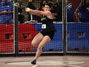 Alison Stephens of Chatham, Ont., competes for the Little Rock Trojans in the weight throw at the 2021 Sun Belt Conference indoor track and field championships. (Little Rock Athletics)
