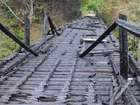 The burned trestle bridge on the Bruce County rail trail over Willow Creek near Paisley.