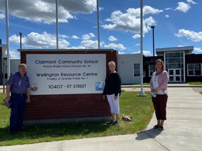 The County of Grande Prairie has named Rhonda Heck (centre) as the 2021 Clairmont Volunteer of the Year. Others in the photo are County of Grande Prairie Councillor Daryl Beeston (left) and  Coree Ladwig Senior, Adult and Community Programs Team Lead, (FCSS) Family and Community Support Services.