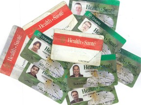 A number of OHIP cards are shown in this file photo.