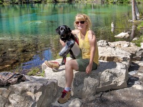 Wendy Everett and her service dog Hedi at Grassi Lakes. photo by Pam Doyle/www.pamdoylephoto.com