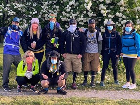 A group of Brantford and area residents attempted to walk 100 kilometres in 24 hours to raise money for cystic fibrosis research on the weekend. In the photo are: Abbey Ball (kneeling, left),  Jim Hladish, Bernie Martin (back, left), Trish Sawdyk-Coverdale, Rachel Levac, Ryan Parks, Thor Ragsten, Mary Palka and Lisa Ramey.