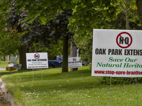 Homeowners along Oakhill Drive in Brantford posted lawn signs opposing the city's plan to construct the Oak Park Road extension, linking the northwest industrial area with West Brant to provide faster access to Highway 403. Photographed  on Thursday June 3, 2021 in Brantford, Ontario. Brian Thompson/Brantford Expositor/Postmedia Network