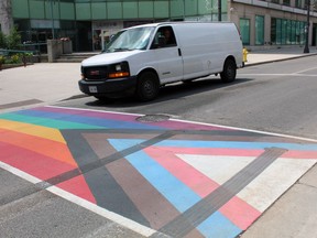 Police are investigating after the newly painted rainbow crosswalk at Colborne and Market streets, in front of the Brantford Public Library, was damaged with tire marks.