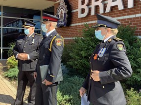 Det. Insp. Randy Gaynor of the OPP, Brantford police Insp. Kevin Reeder and OPP Chief Supt.  Kari Dart stand outside the Brantford police station Thursday morning as they prepared to update media on Project Grantham -- an investigation focused on finding the killers of three people in July 2019. Eight people have now been arrested in the almost two-year investigation. Susan Gamble