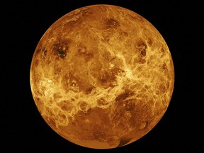 This file photo released by NASA shows Venus in a composite of data from NASA's Magellan spacecraft and Pioneer Venus Orbiter. NASA announced two new missions to Venus that will launch at the end of the decade and are aimed at learning how Earth's nearest planetary neighbour became a hellscape while our own thrived.