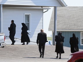 Churchgoers arrive for a service Sunday, June 6, at the Old Colony Mennonite Church in Wheatley. Mark Malone/Postmedia Network