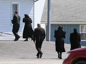 Churchgoers arrive for a service at the Old Colony Mennonite Church in Wheatley, Ont., on Sunday, June 6, 2021. (Mark Malone/Chatham Daily News)